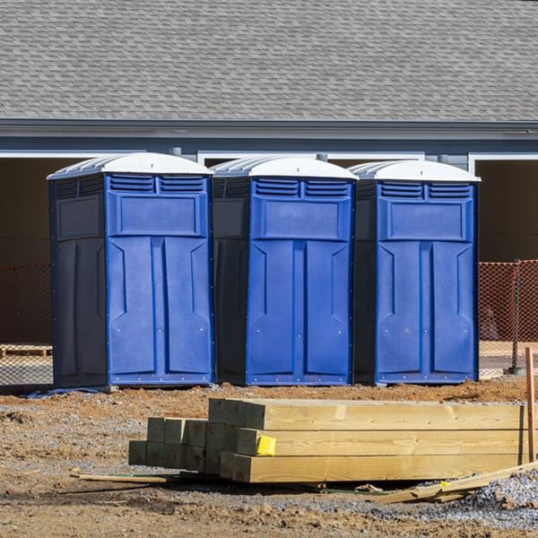 what is the cost difference between standard and deluxe porta potty rentals in Williston Tennessee